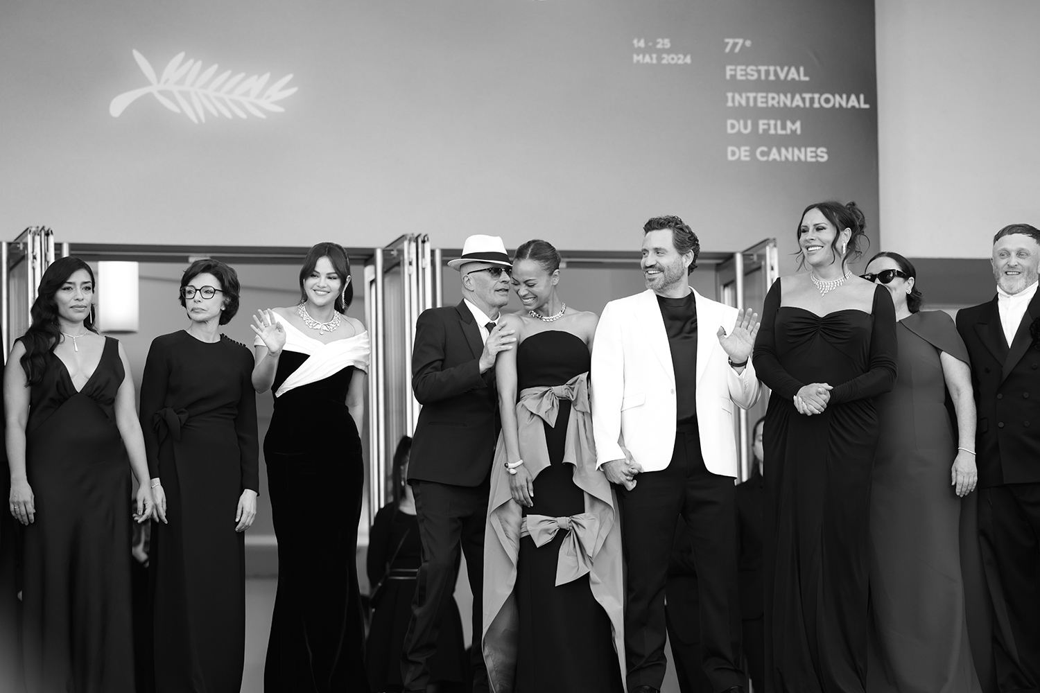 a gorgeous Sain Laurent image with the cast of Emilia Perez and Jacques Audiard 
